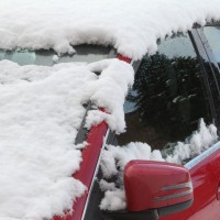 Defrosting windshield with hot water