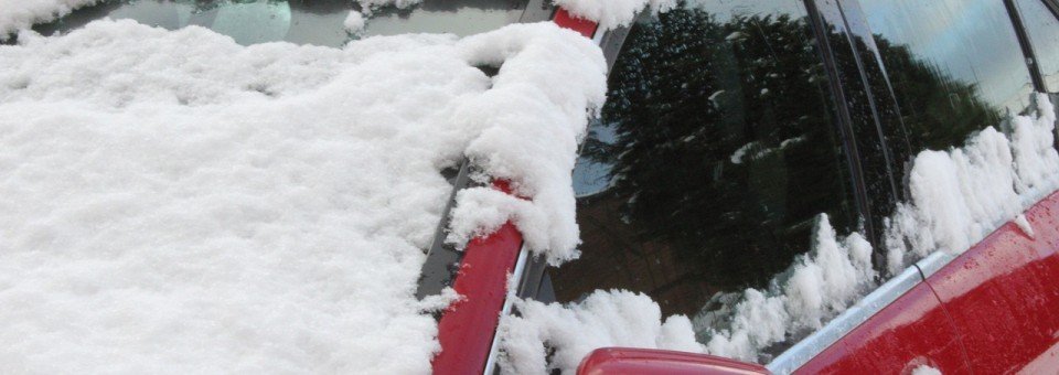 Defrosting windshield with hot water